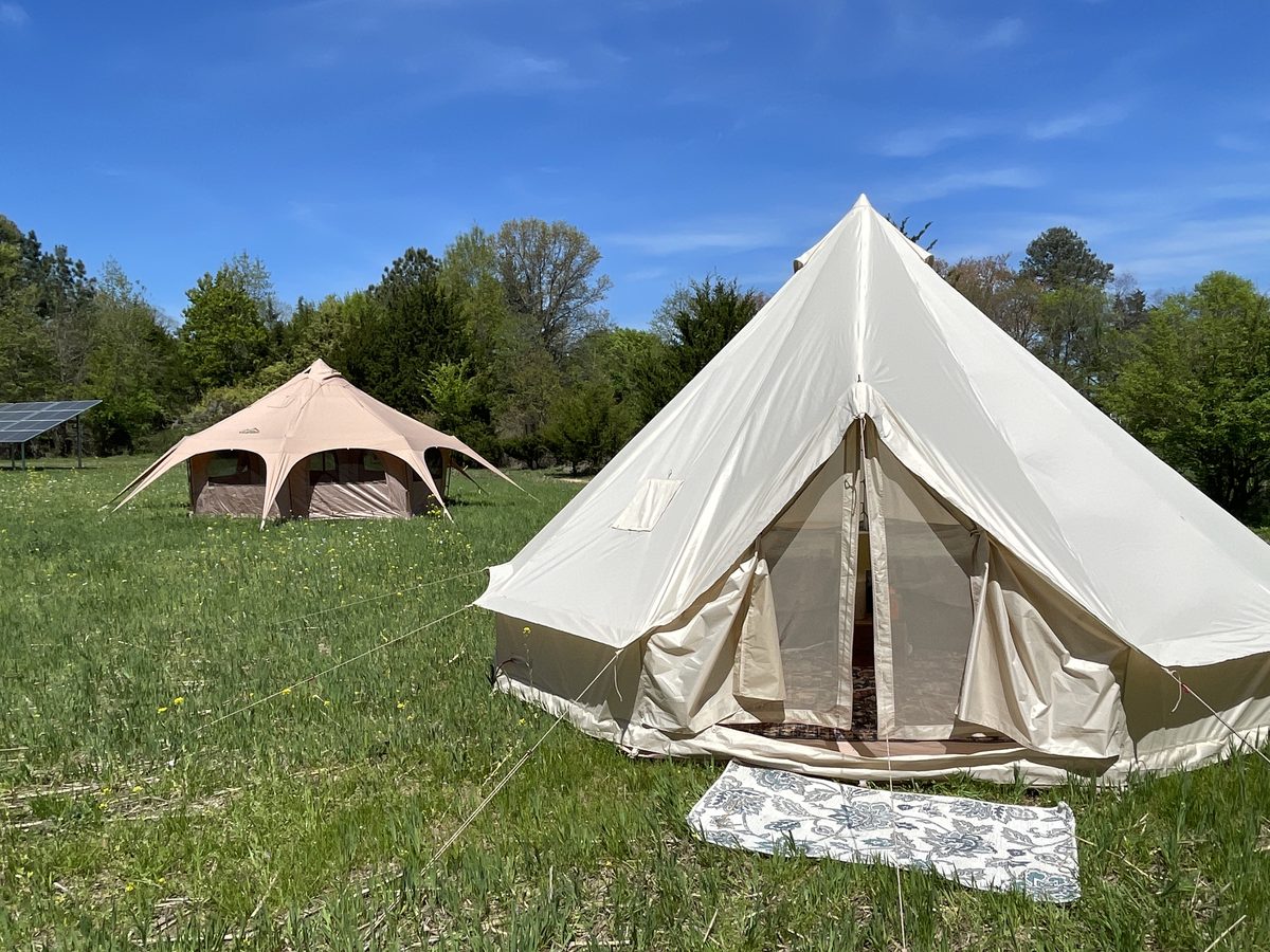 Farmhouse accommodations and glamping tent at Black Soil Rising Farm